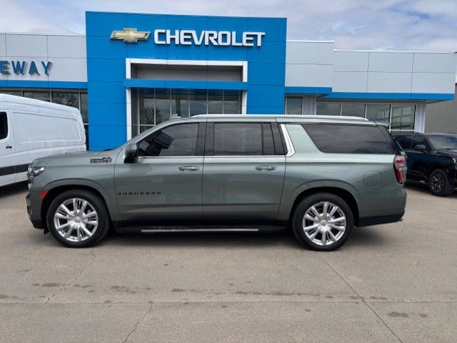 2024 Chevrolet Suburban High Country in Silver Sage Metallic — front three-quarter view