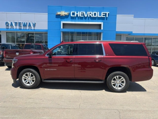 2020 Chevrolet Suburban LT in Siren Red Tintcoat — front three-quarter view
