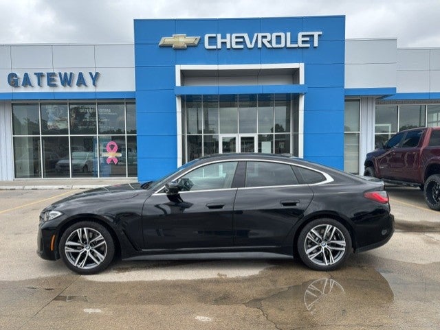 2024 BMW 4 Series 430i xDrive in Black — front three-quarter view